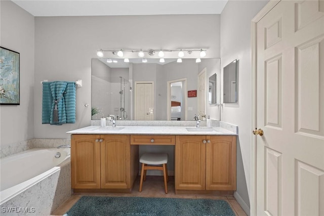 bathroom featuring tile patterned flooring, vanity, and plus walk in shower