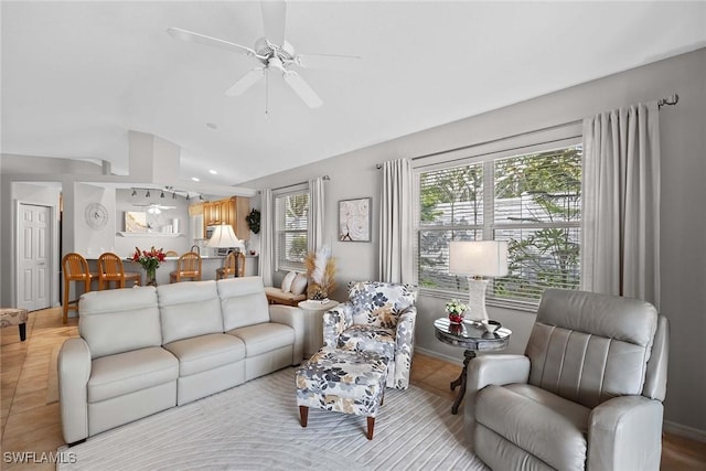 living room featuring ceiling fan