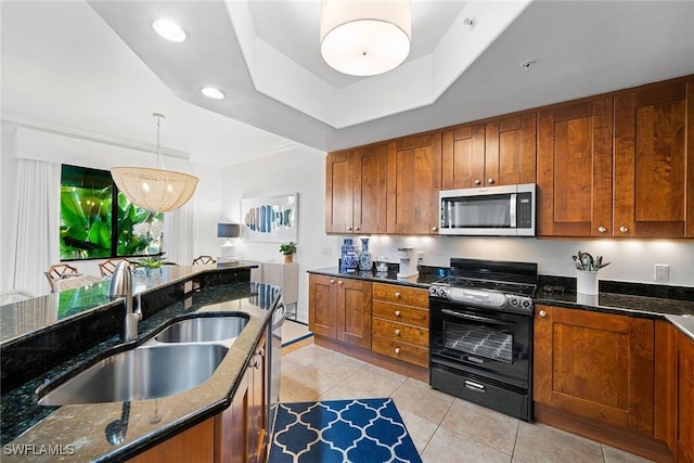 kitchen featuring light tile patterned flooring, black gas range, dark stone counters, and sink