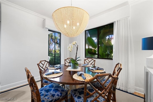 dining room featuring an inviting chandelier and crown molding