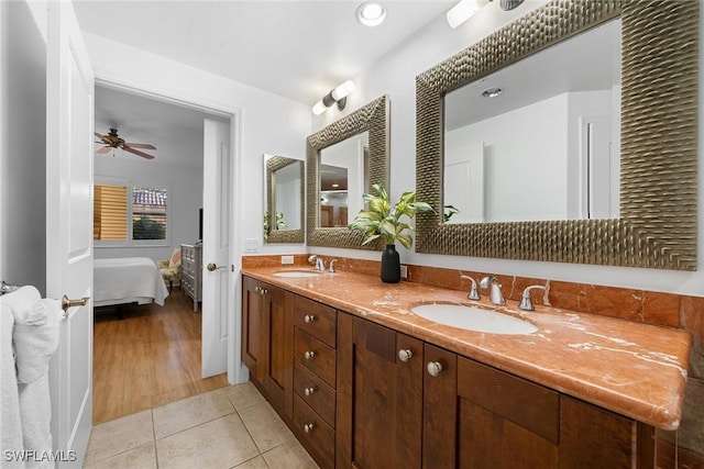 bathroom with tile patterned floors, ceiling fan, and vanity