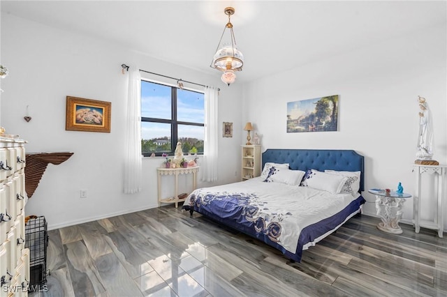 bedroom featuring wood-type flooring