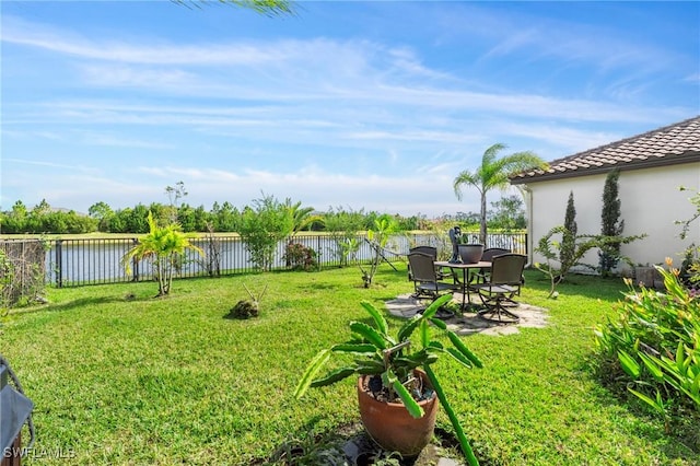 view of yard with a water view