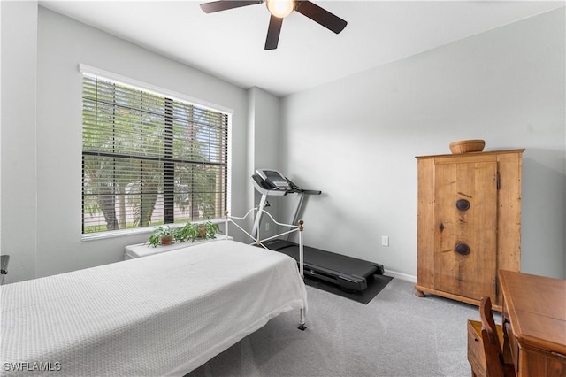 carpeted bedroom featuring ceiling fan