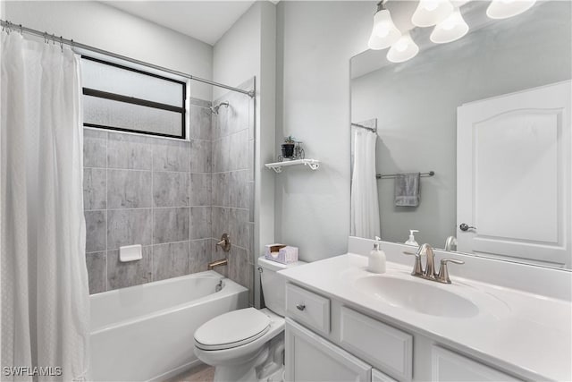 full bathroom with vanity, toilet, and shower / tub combo