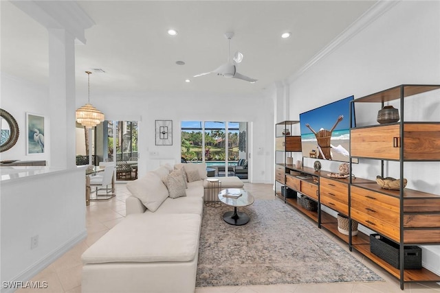 living room with light tile patterned floors and crown molding