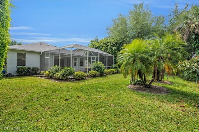 view of yard featuring a lanai