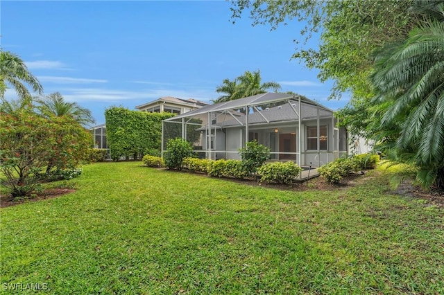 view of yard featuring a lanai