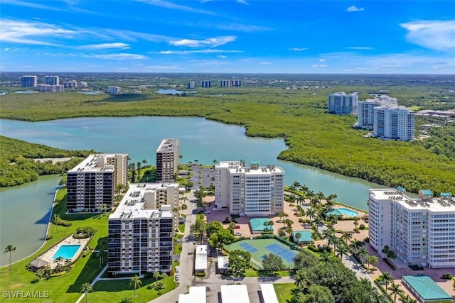 drone / aerial view with a water view and a view of city