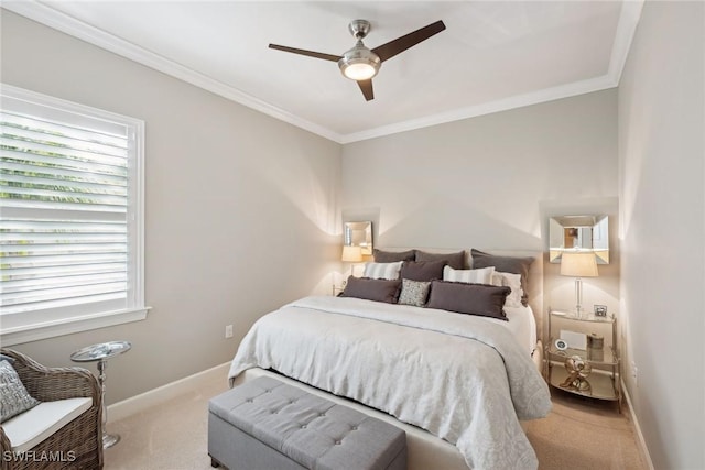 bedroom featuring light carpet, ceiling fan, and crown molding