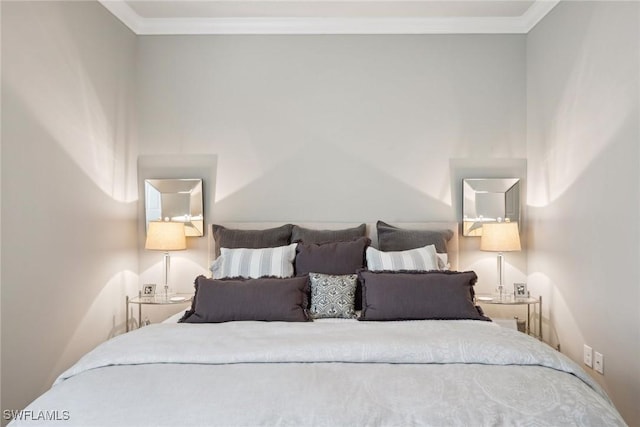 bedroom with crown molding