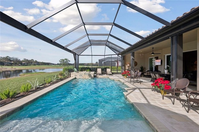 view of pool with an in ground hot tub, a patio, a water view, and a lanai