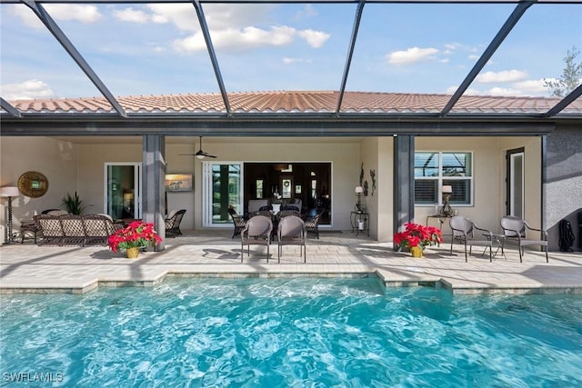 back of house featuring ceiling fan and a patio