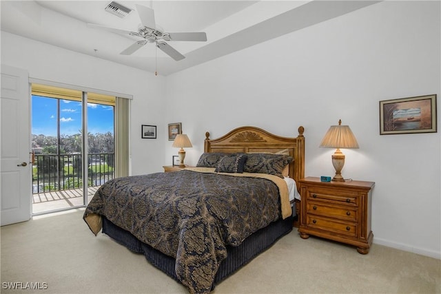 bedroom with access to exterior, ceiling fan, and light carpet