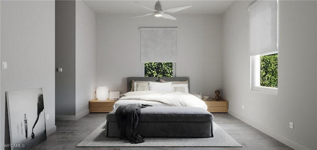 bedroom featuring ceiling fan and light wood-type flooring