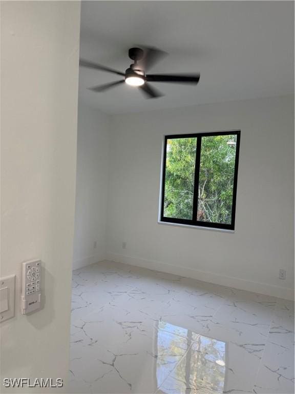 unfurnished room with ceiling fan