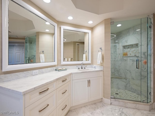 bathroom featuring vanity and walk in shower