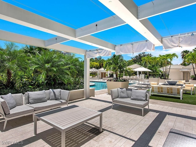 view of patio with an outdoor hangout area and a pergola