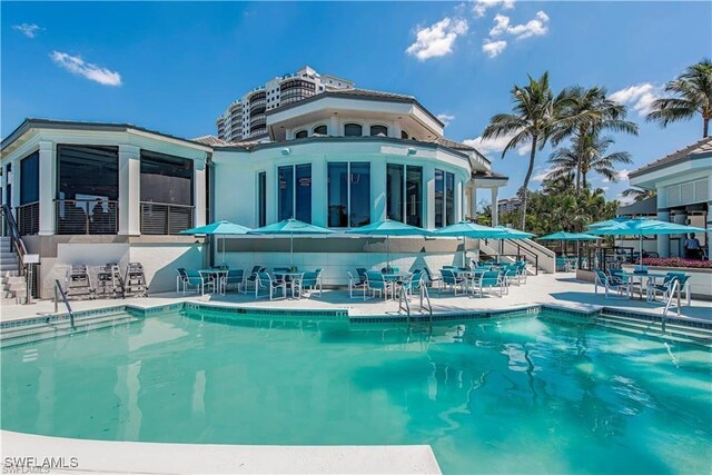 view of swimming pool featuring a patio