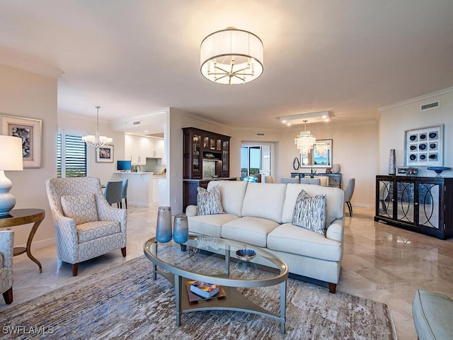 living room with a notable chandelier and ornamental molding