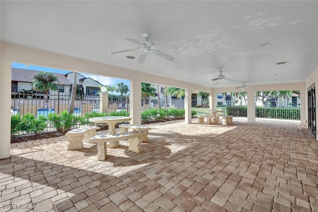 view of patio / terrace featuring ceiling fan