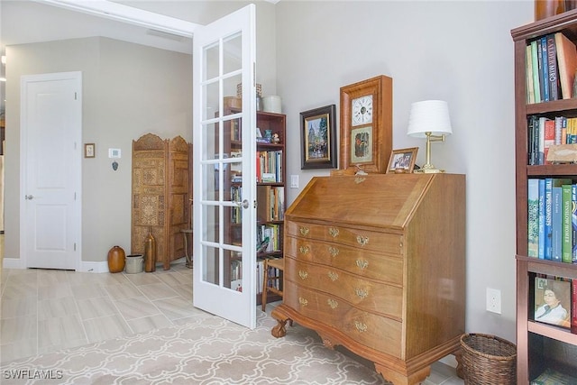 sitting room featuring french doors