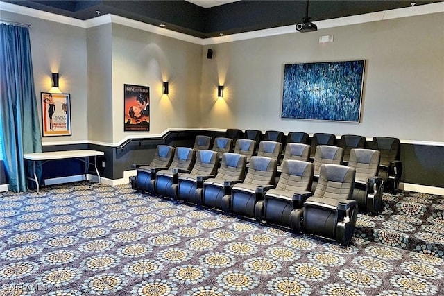 carpeted cinema room with ornamental molding