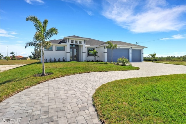 single story home with a front lawn and a garage