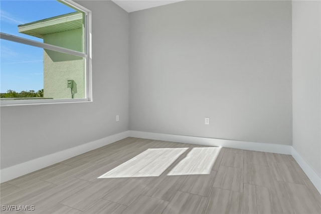 unfurnished room featuring light hardwood / wood-style flooring