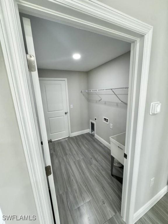 laundry area featuring hardwood / wood-style floors, washer hookup, and hookup for an electric dryer