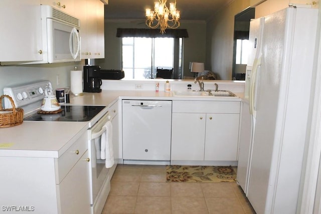 kitchen with white cabinetry, sink, a chandelier, white appliances, and light tile patterned floors