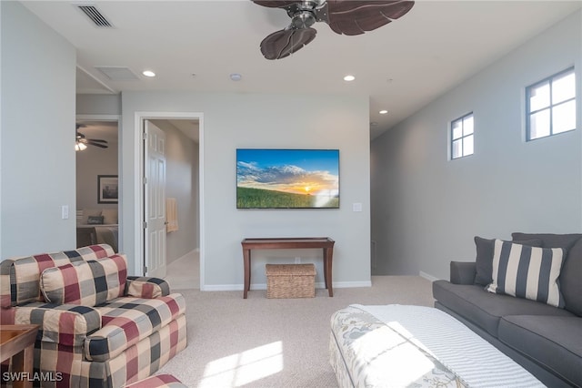 living room featuring light colored carpet