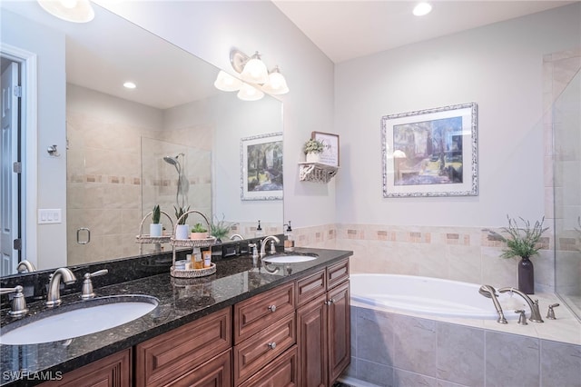 bathroom with vanity and plus walk in shower