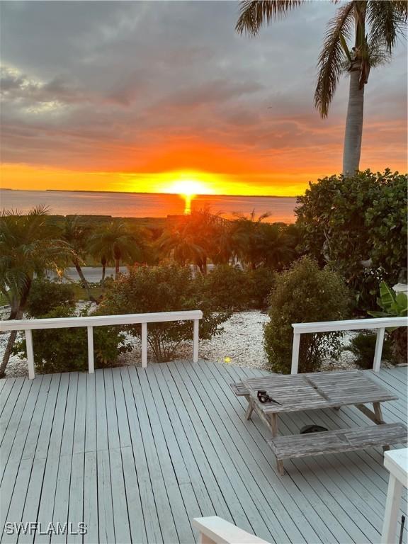 deck at dusk with a water view