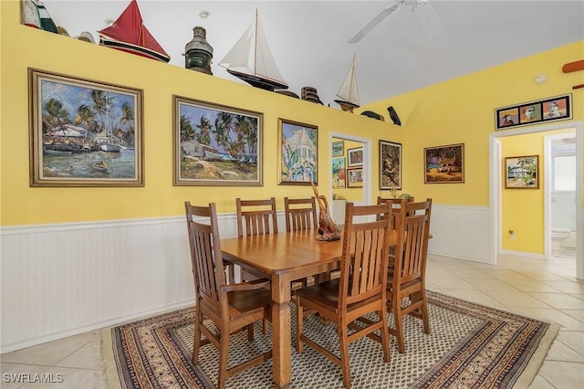 dining area featuring ceiling fan and light tile patterned flooring