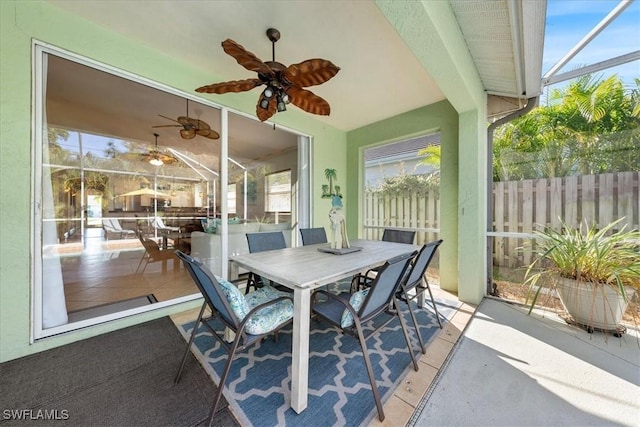 sunroom / solarium with ceiling fan