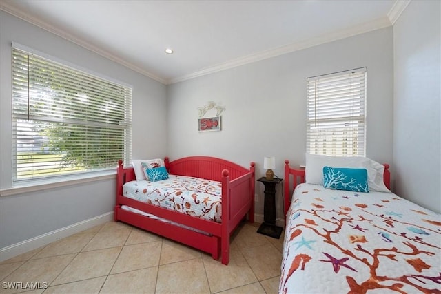 bedroom with light tile patterned floors and ornamental molding