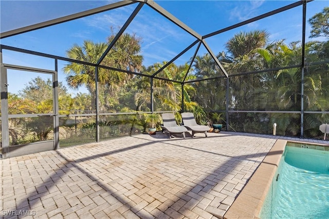 view of patio / terrace with glass enclosure