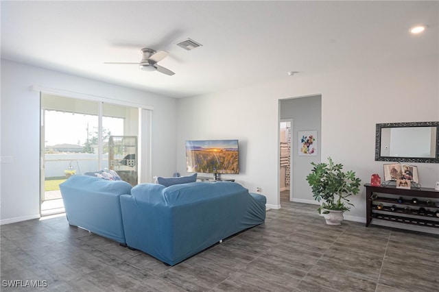 living room featuring ceiling fan