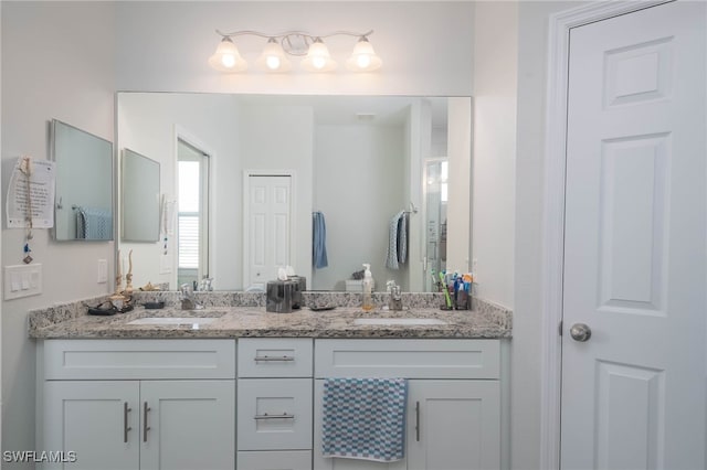 bathroom featuring vanity