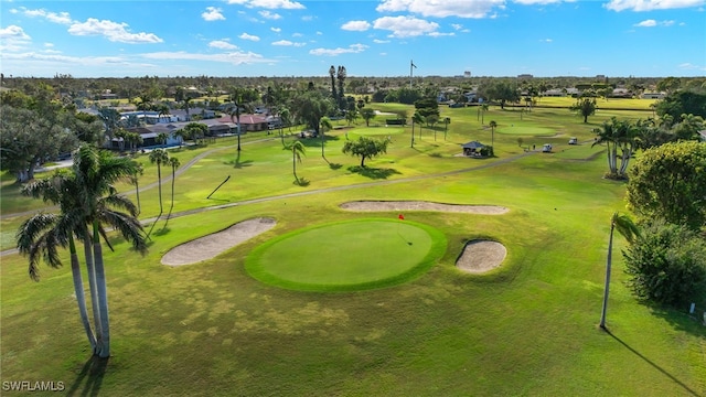 view of home's community featuring view of golf course