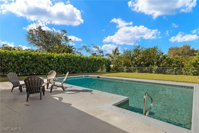 view of pool with a fenced in pool, a patio area, and fence