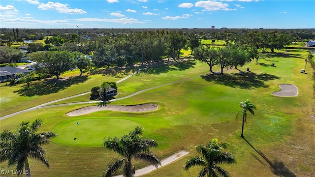 birds eye view of property featuring view of golf course