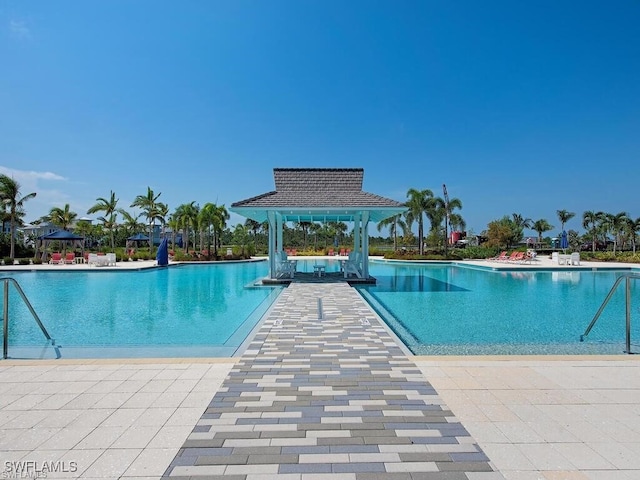 view of pool featuring a gazebo and a patio