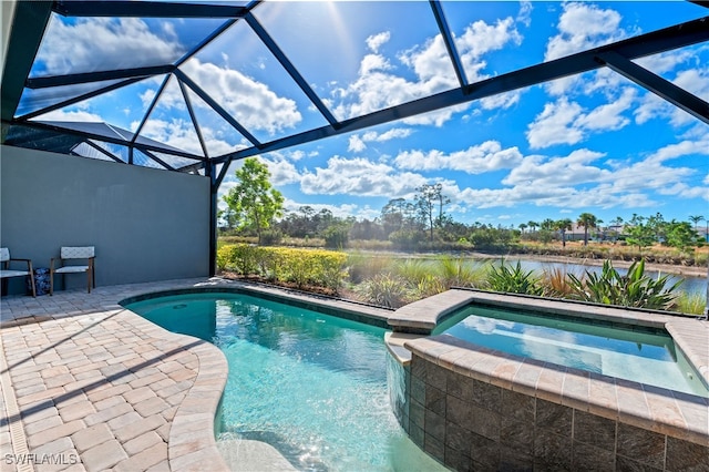 view of swimming pool with an in ground hot tub, a water view, a lanai, and a patio area