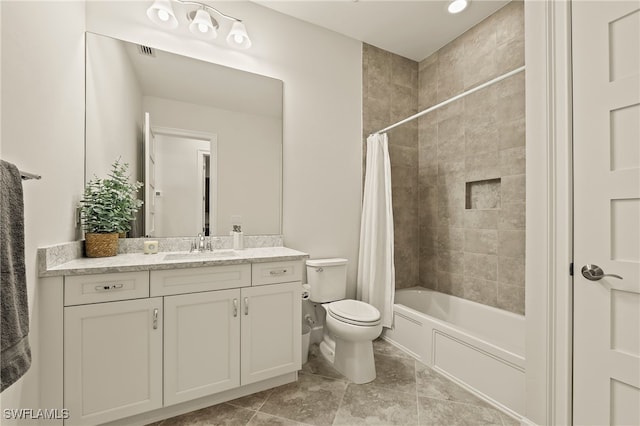 full bathroom with vanity, toilet, and shower / bath combo with shower curtain