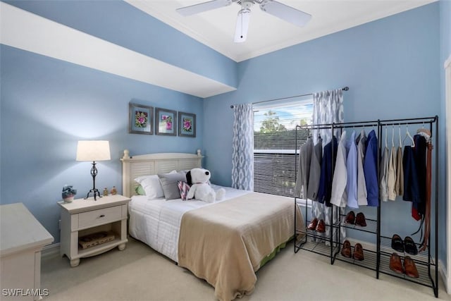 bedroom with light carpet, ceiling fan, and ornamental molding