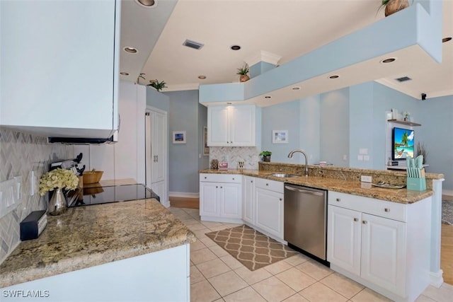 kitchen with kitchen peninsula, dishwasher, white cabinets, and sink