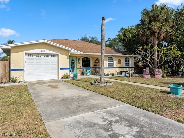 single story home featuring a front lawn, a porch, and a garage