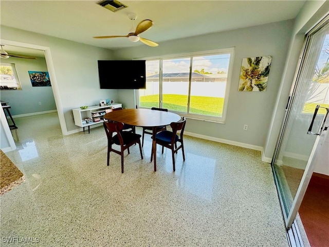 dining area featuring ceiling fan